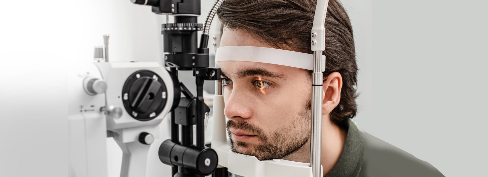 young man during eye exam in Lexington